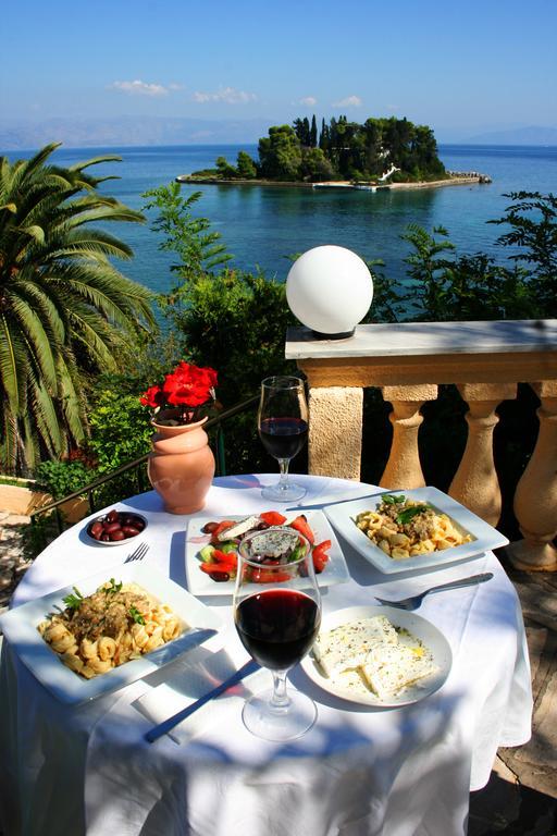 Aegli Hotel Перама Экстерьер фото